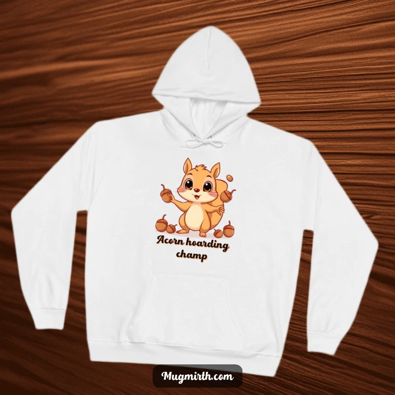 Funny hoodie featuring a squirrel in a whirlwind of juggling acorns, its eyes wide with a comical sense of urgency.
