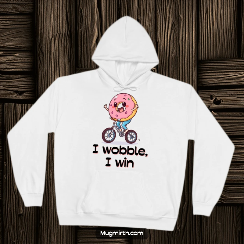 Funny donut hoodie, a character riding a tiny unicycle with comical wobbles, providing warmth and humor.