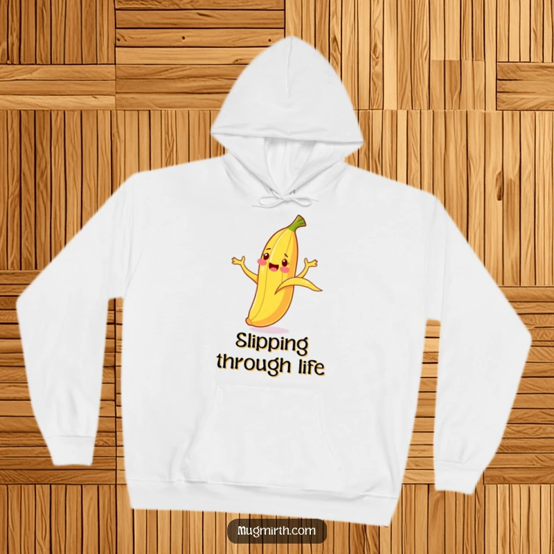 Funny Banana Slip Hoodie: A cheerful banana cartoonishly flails while slipping on its own peel, radiating warmth.