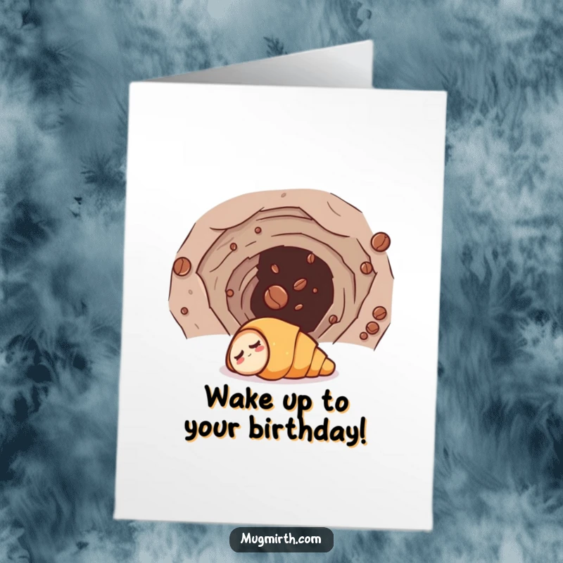 Funny free printable birthday card: a sleepy croissant is pulled into a wormhole by a mischievous coffee bean.