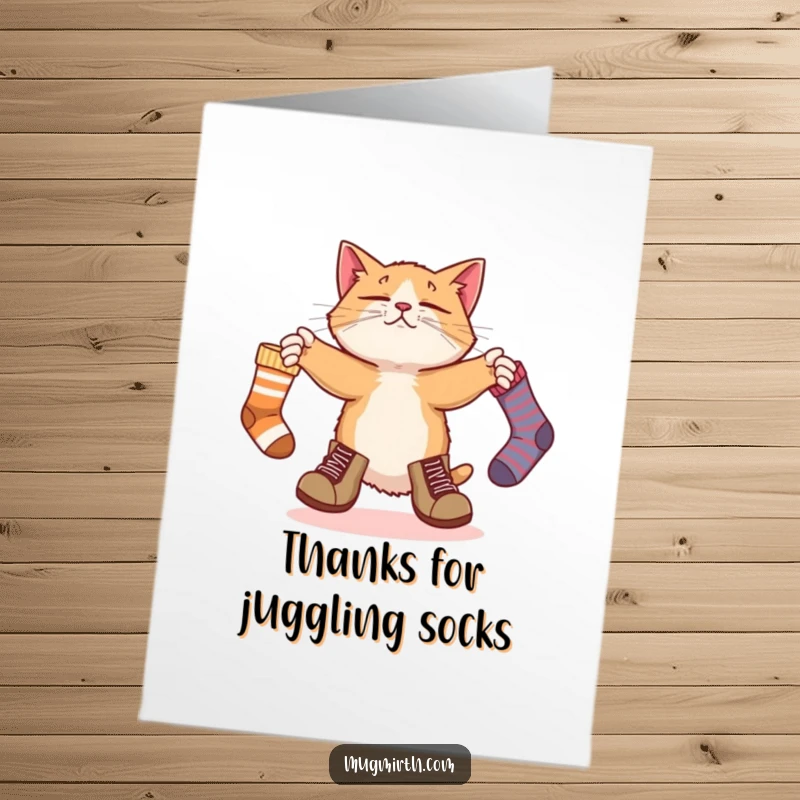 Funny Free Printable Thank You Card: A bewildered cat attempts to juggle socks, expressing gratitude with chaotic charm.
